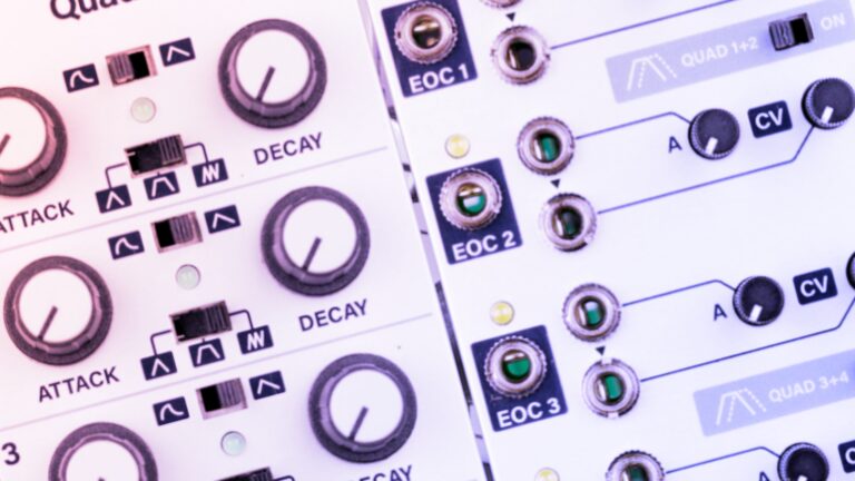 Close-up of a white Eurorack envelope module with Attack, Decay, and EOC labels