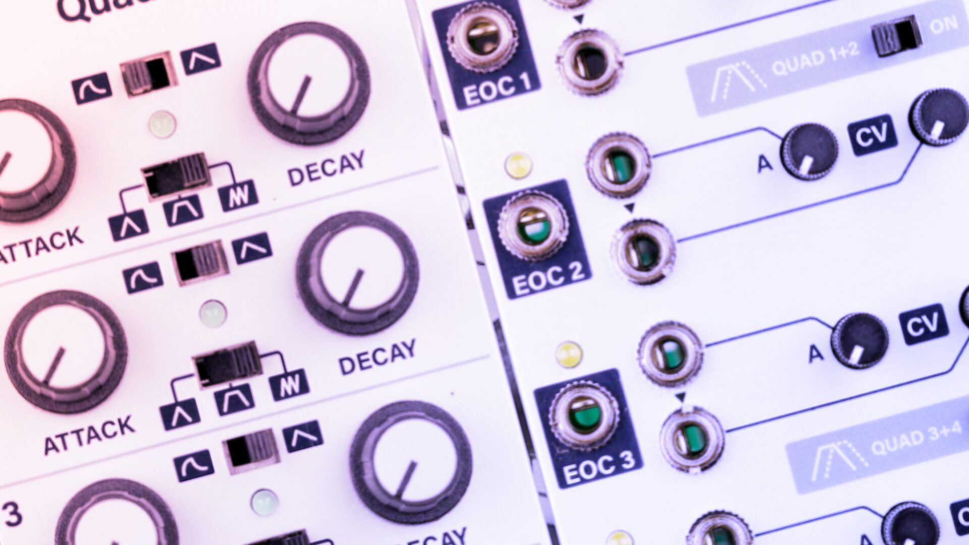 Close-up of a white Eurorack envelope module with Attack, Decay, and EOC labels