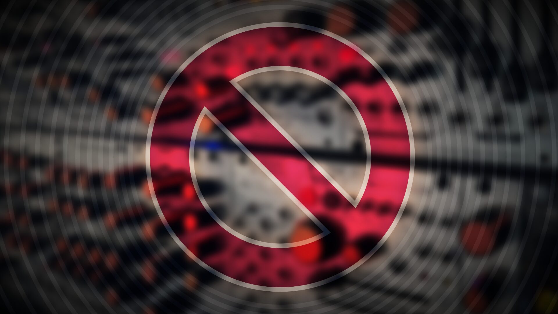 Red prohibition sign over a blurred wall of Eurorack modules