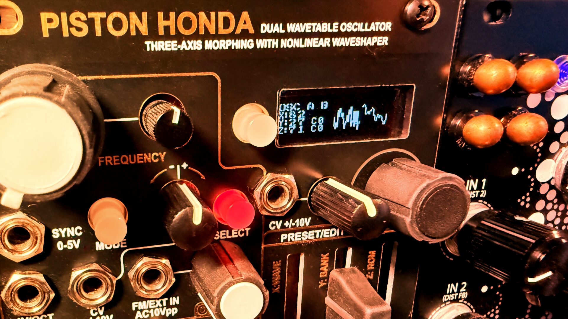Piston Honda MkIII dual wavetable oscillator module with orange knobs and a small display