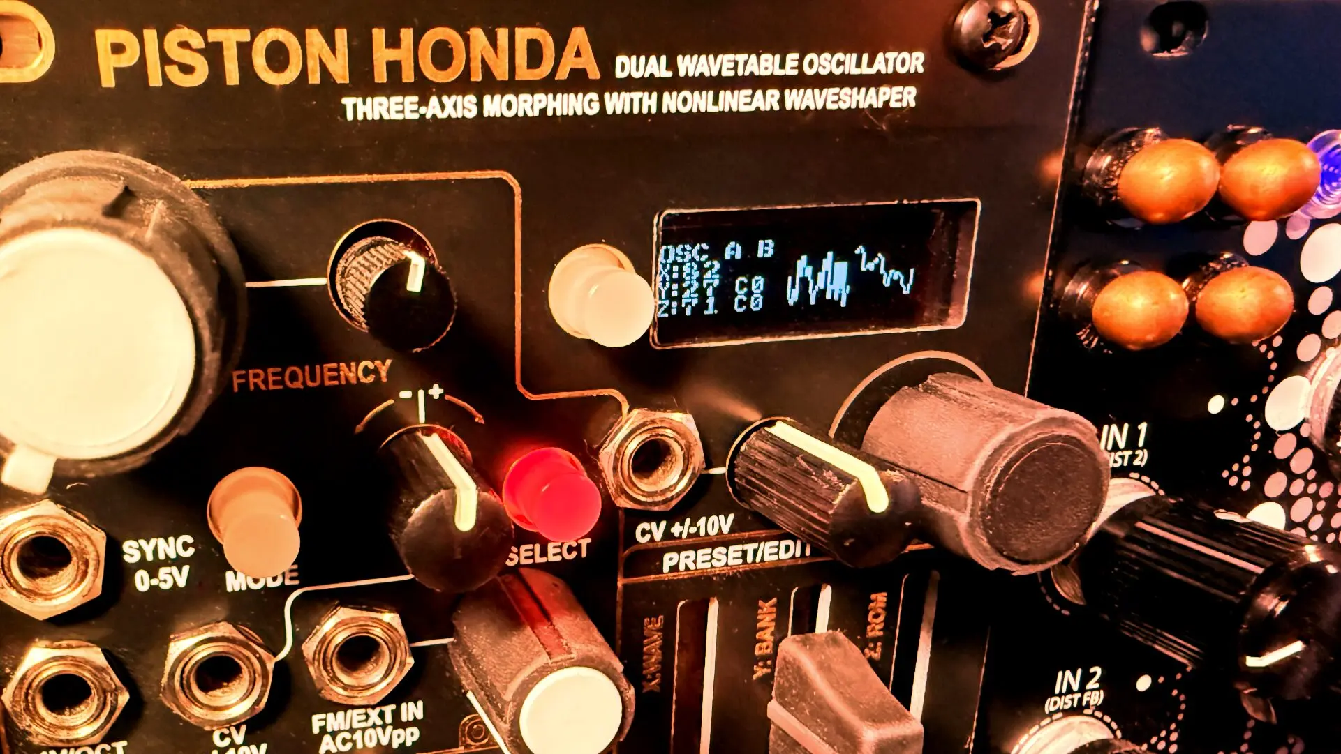 Piston Honda MkIII dual wavetable oscillator module with orange knobs and a small display